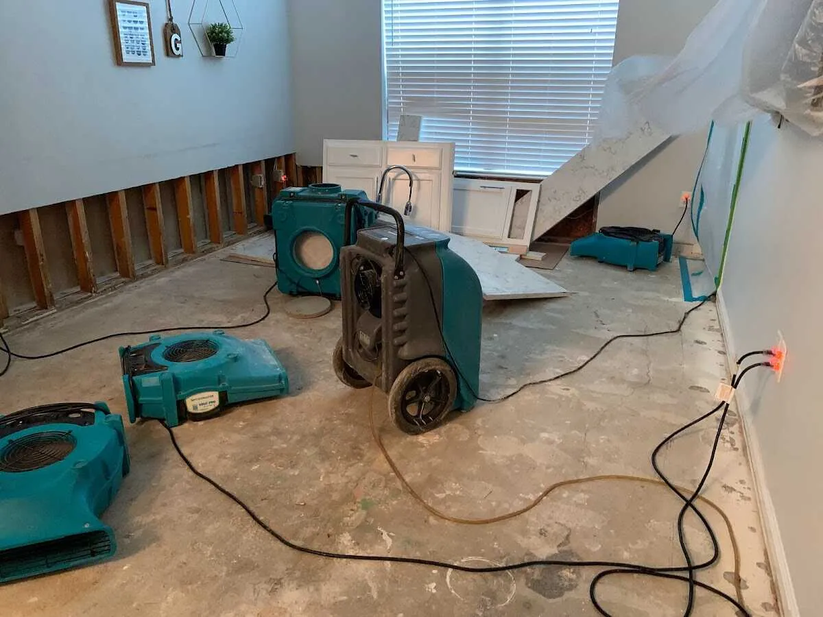 Dehumidifier in flood-cut room for Water Damage Restoration in University of California-Davis